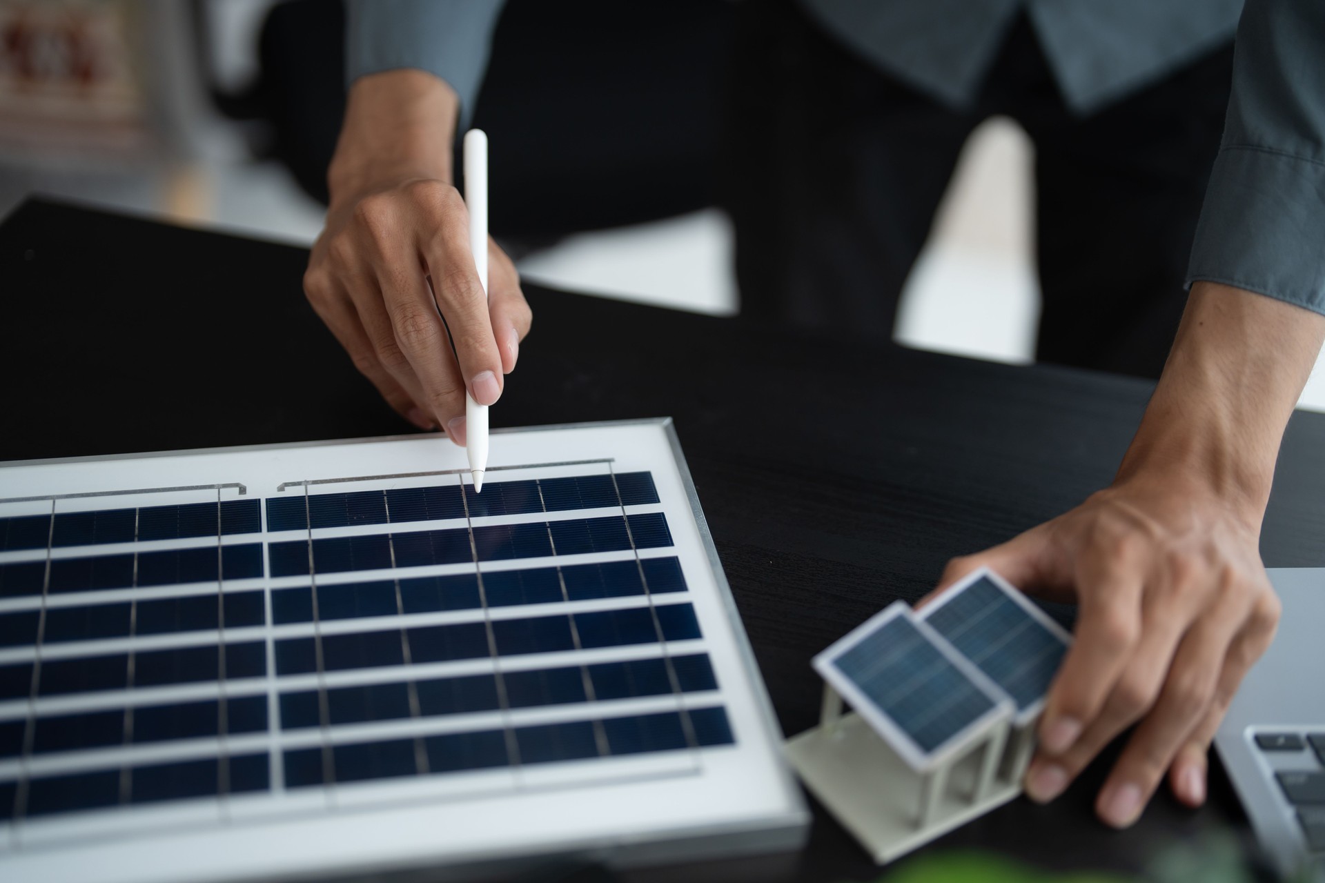 Solar panels green energy Business man working  green eco friendly office business creative idea Planing Bio economy for business eco friendly professional Engineer sustainable electricity